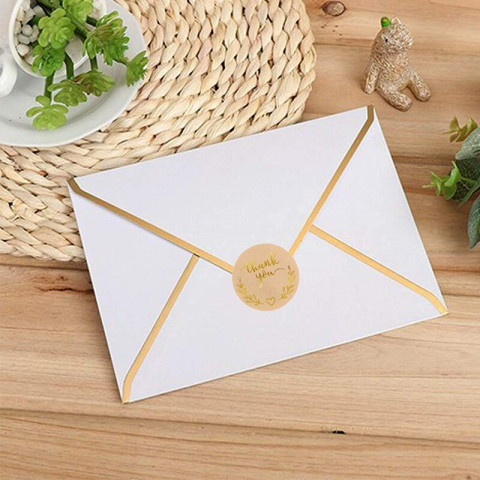Sticker pour fermer une enveloppe.
