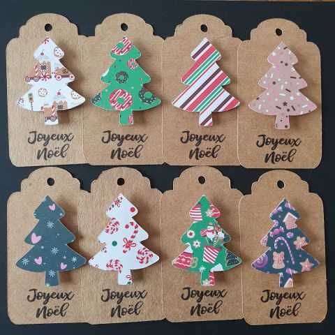 Exemples de papier décorés pour sapin Joyeux Noël.